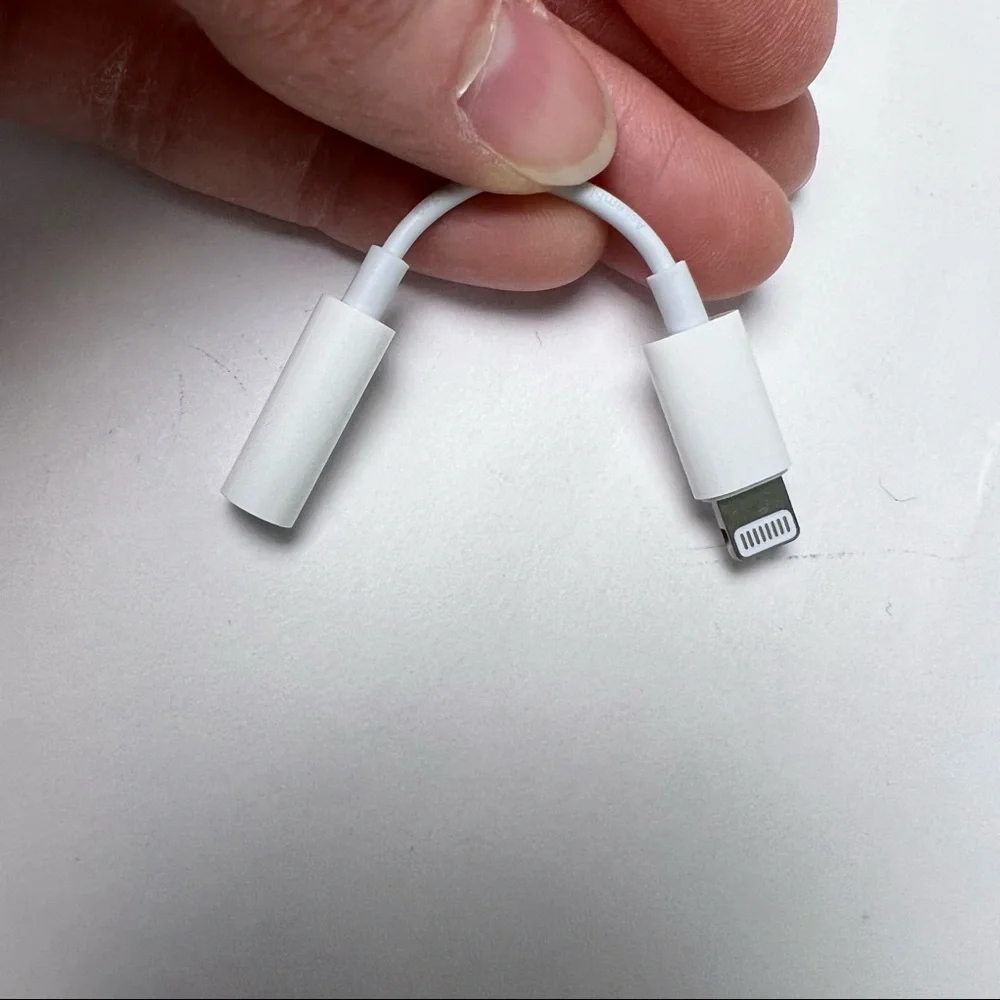 Never Used - Apple Adapter - 3.5mm headphone jack to lightning port adapter
